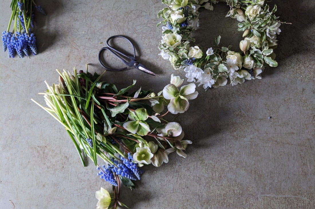 Pod & Pips home grown seasonal flowers, laid out beautifully by the side of a flower crown.